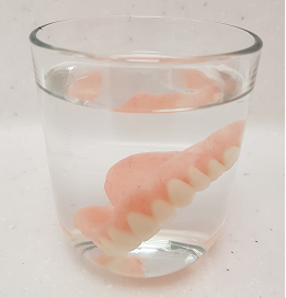 Denture in water